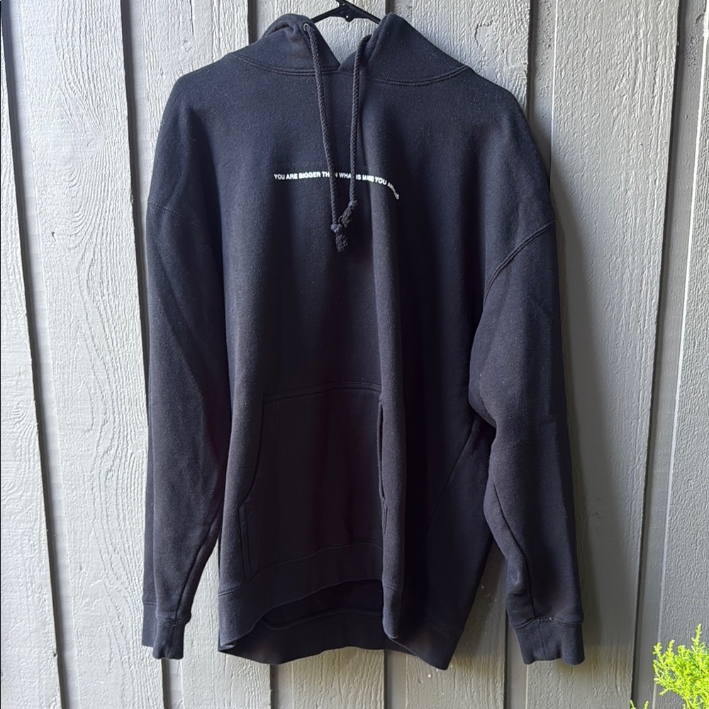 Black Hoodie with White Text by Onside We’re all the Same size xl